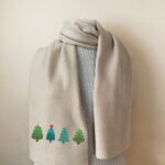 Christmas Tree Scarf with cute festive tree designs on beige fleece